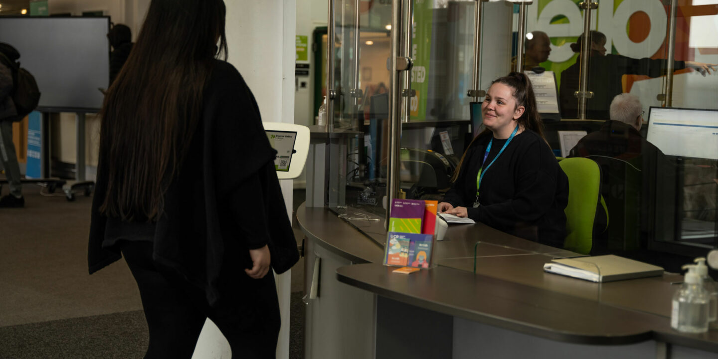 At a reception desk