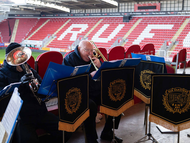 The band playing during graduation day
