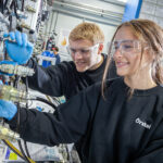 Two students in the National Fluid Power Centre