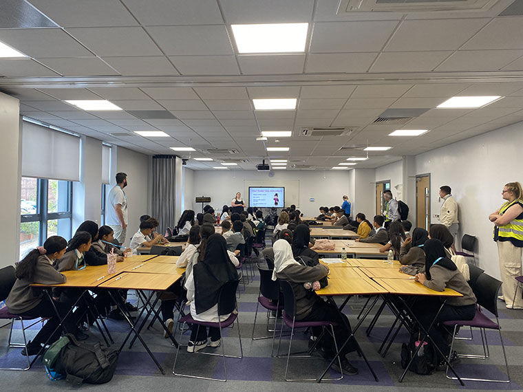Year 6 taster day at UCR - people sat around tables