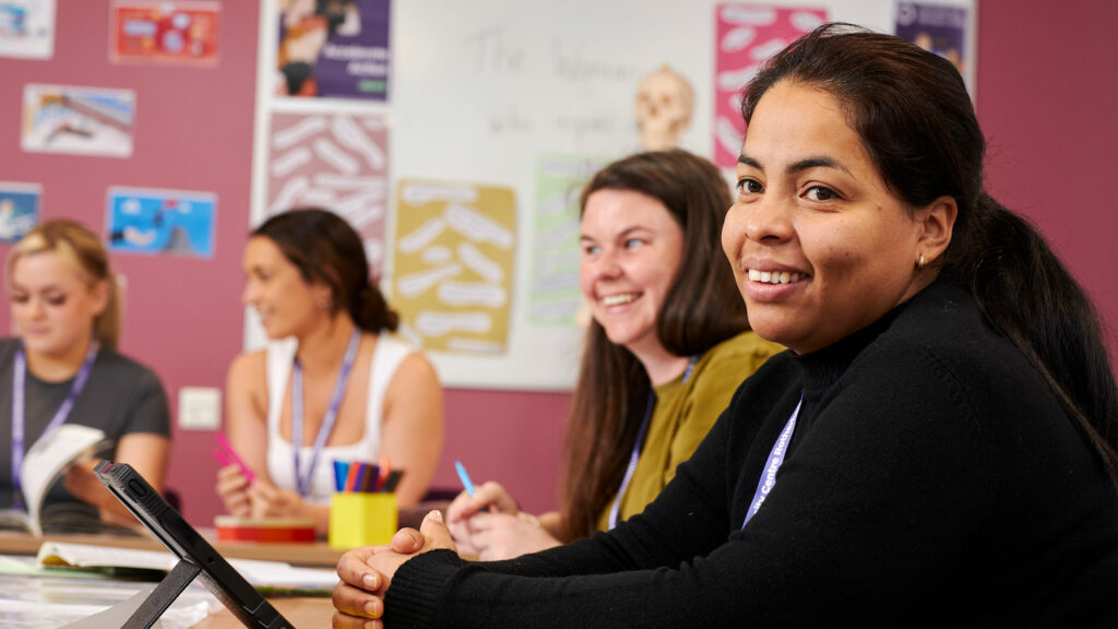 Health students sat at a desk