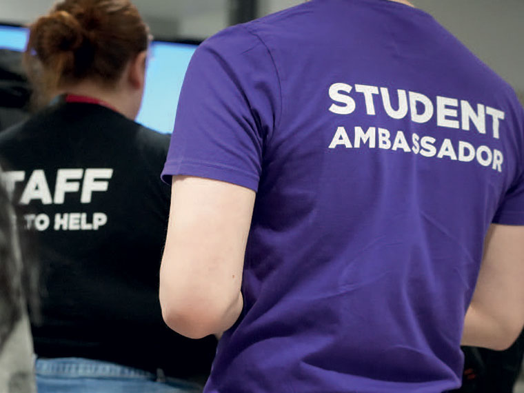 Student Ambassador written on the back on someones T shirt