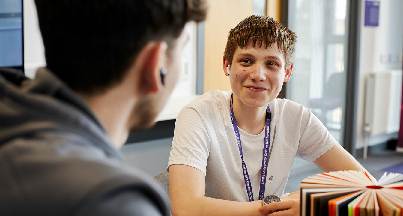 Two students sat at a table