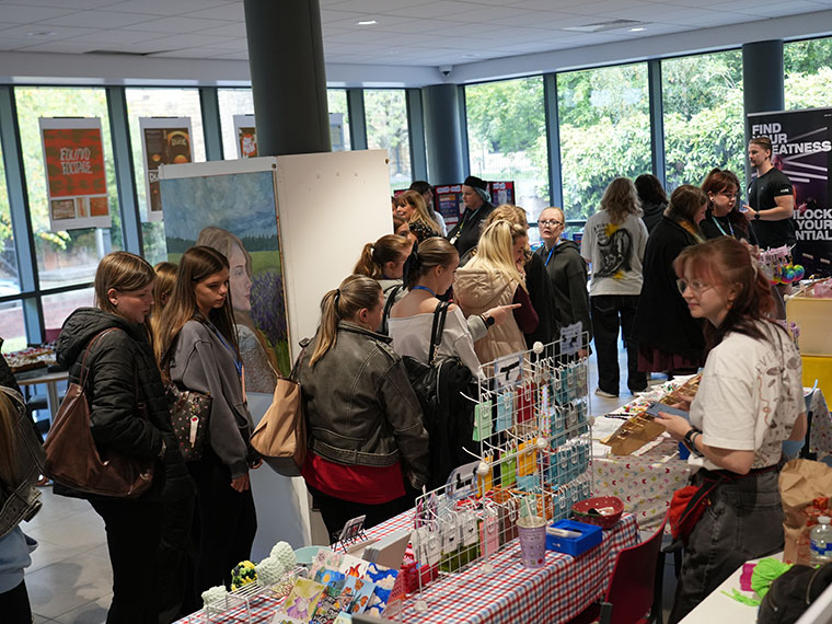 People looking around the stalls at the Freshers Fair